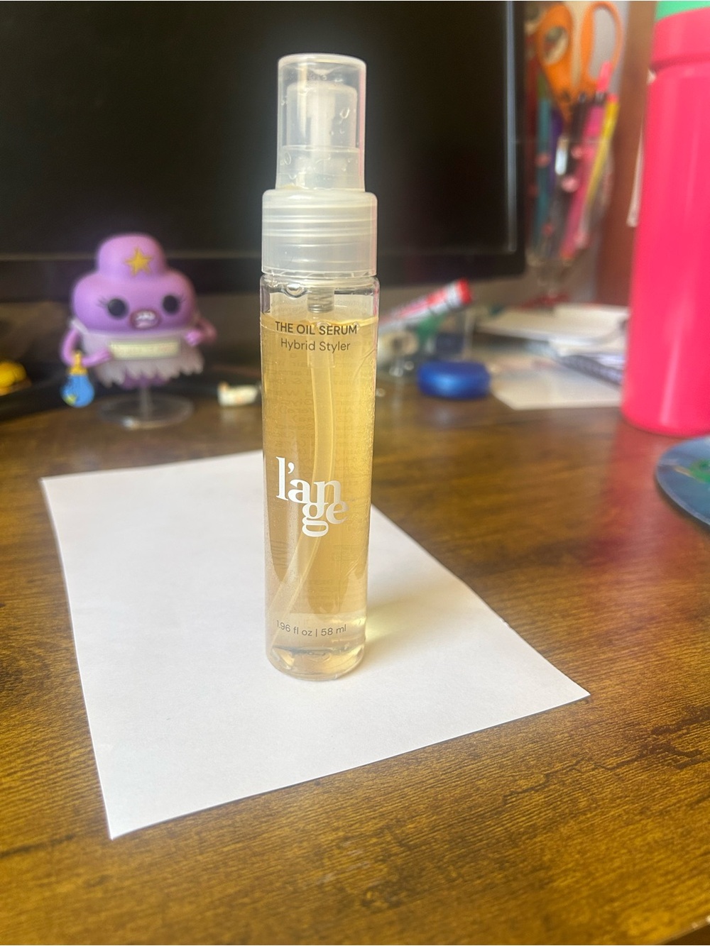 L'ange The Oil Serum Hybrid Styler in golden clear bottle, not used.